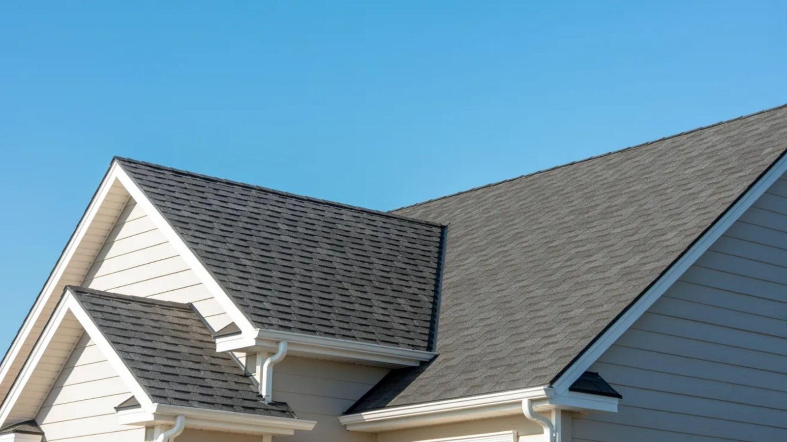 A house roof featuring a gray color, showcasing a simple and modern architectural design.