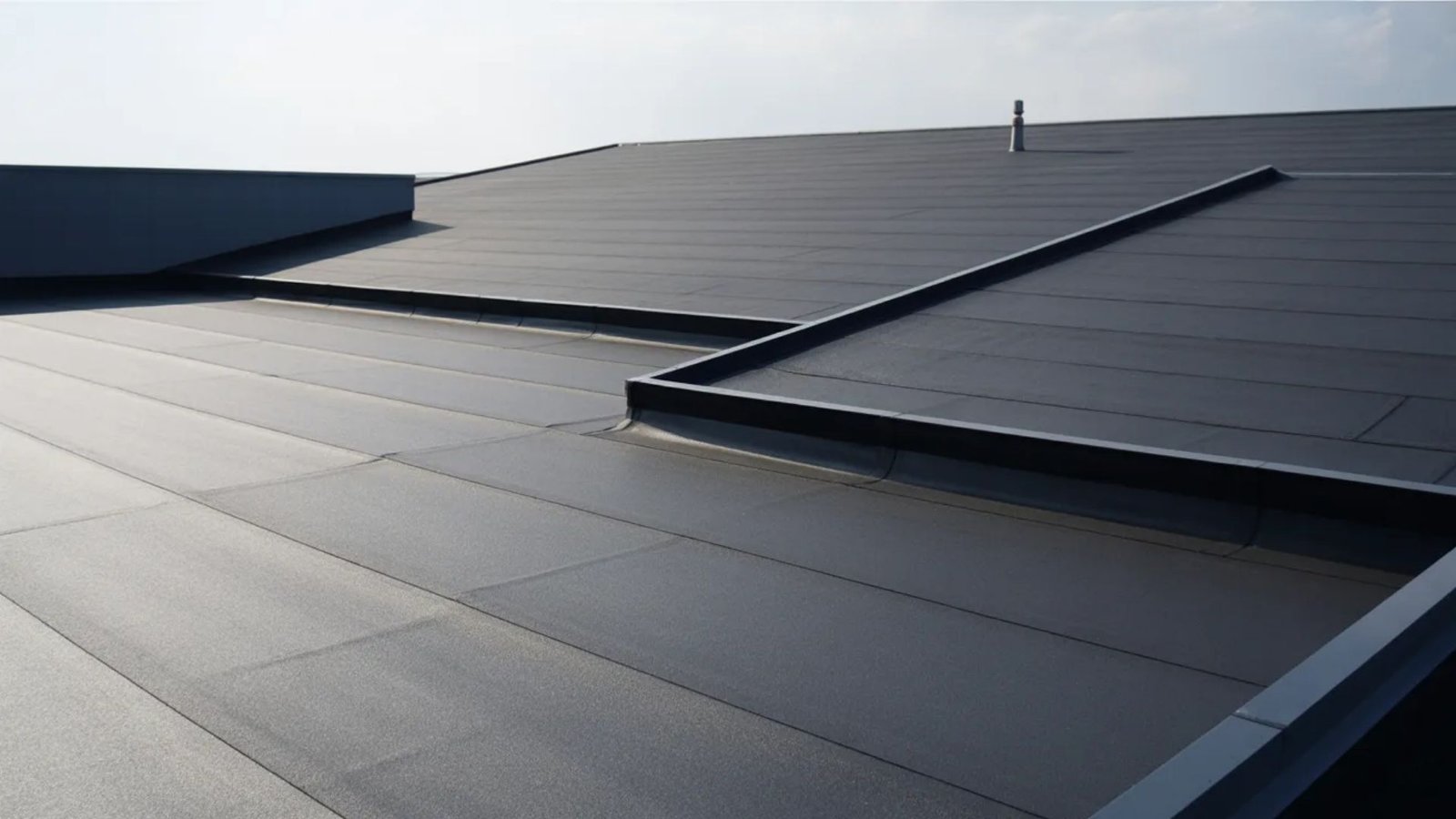 A flat roof structure, showcasing a smooth, level surface without any slopes or angles.